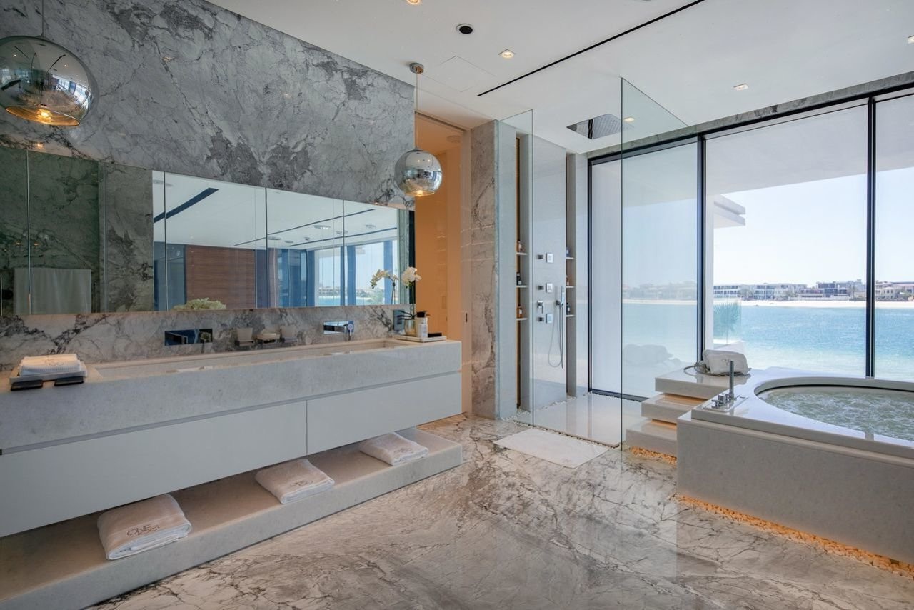 Dinh thu Dubai tang kem 2 sieu xe anh 12