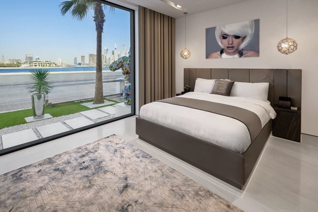 Dinh thu Dubai tang kem 2 sieu xe anh 13