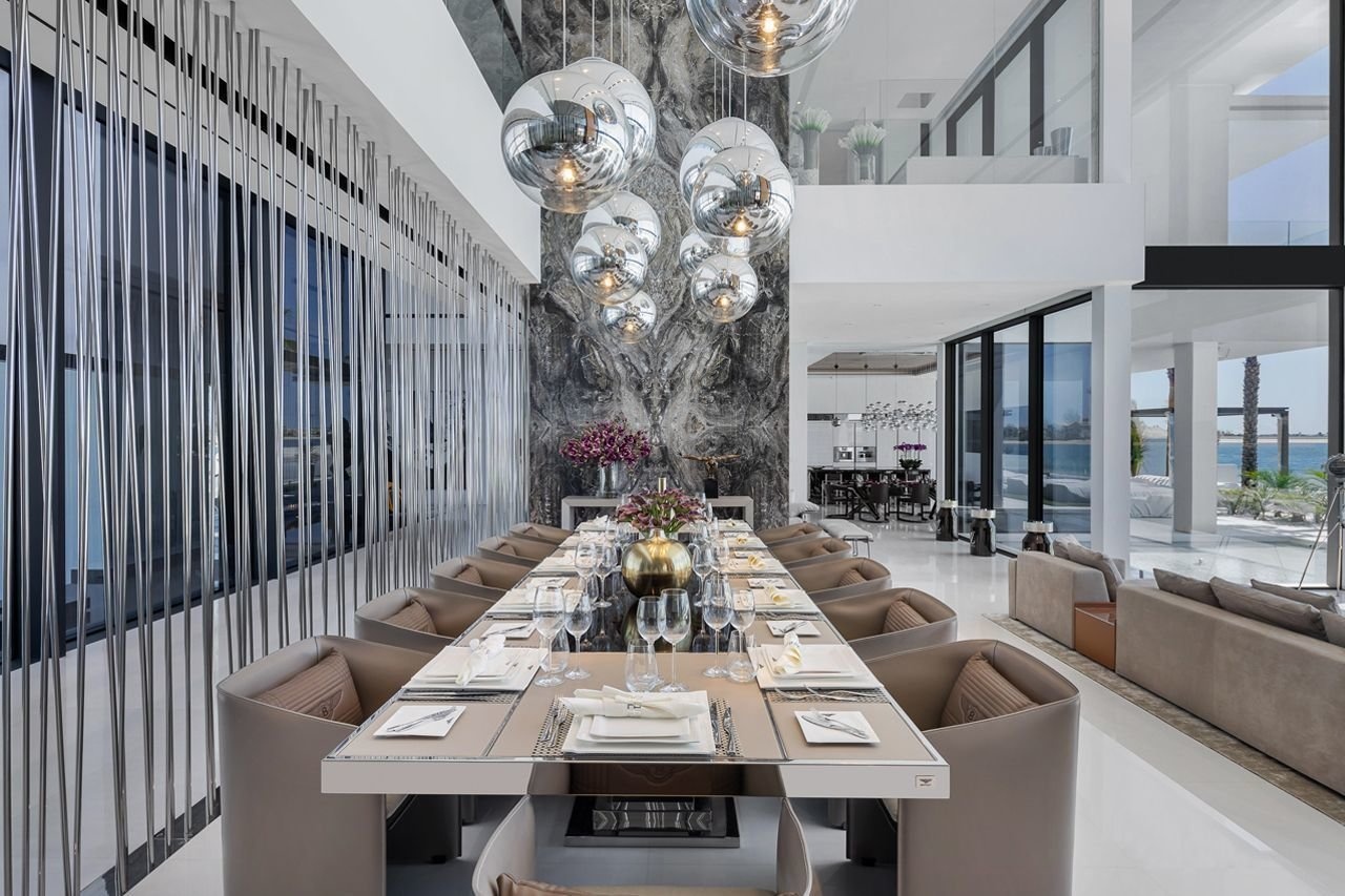 Dinh thu Dubai tang kem 2 sieu xe anh 3