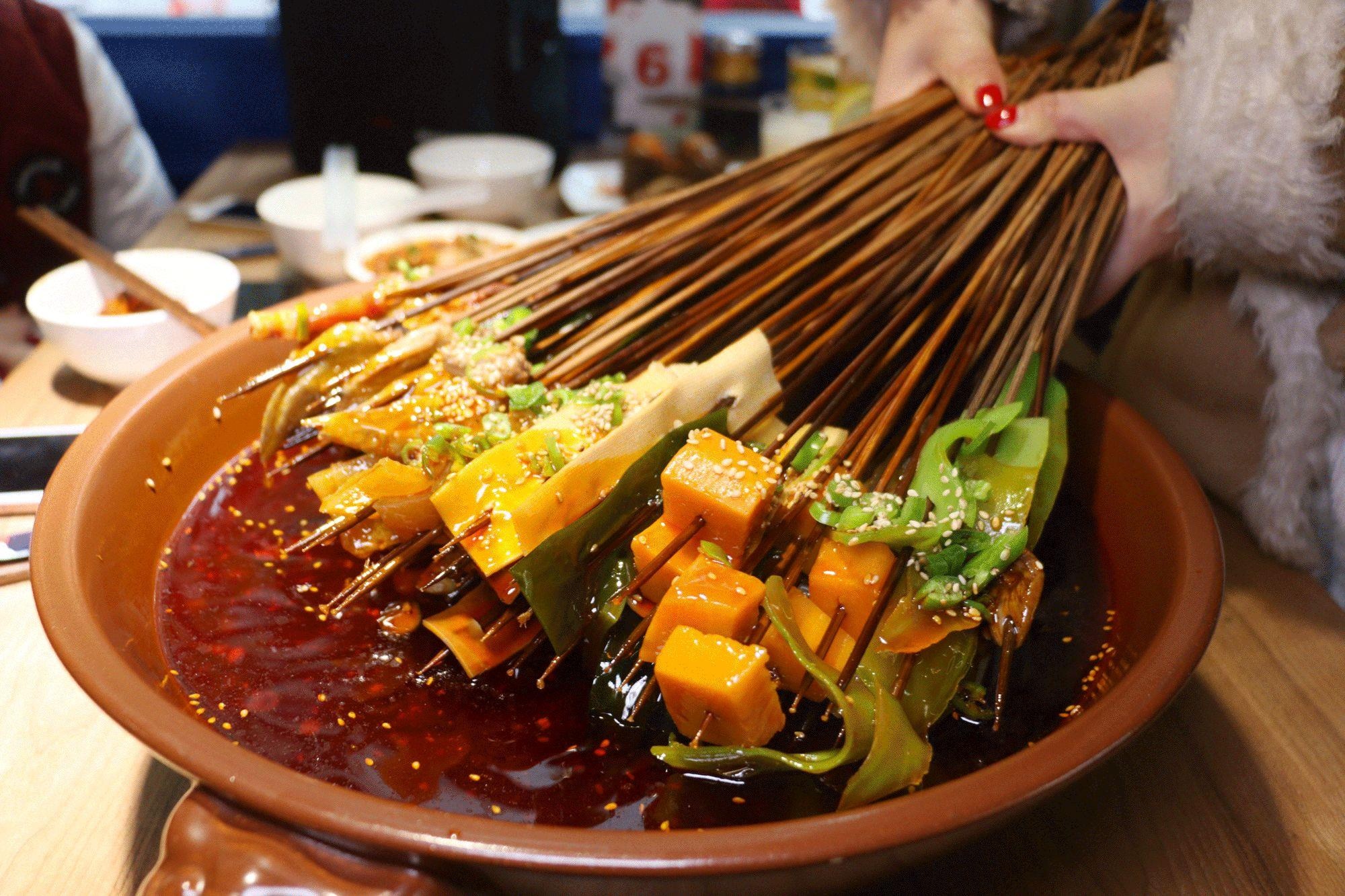 Dau tho, banh thit va 5 mon an vat khong the bo lo khi den Tu Xuyen hinh anh