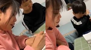 Ba me Trung Quoc bat khoc khi day con tap viet hinh anh