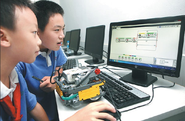 Trung Quoc dua lap trinh, viet code vao bac tieu hoc hinh anh