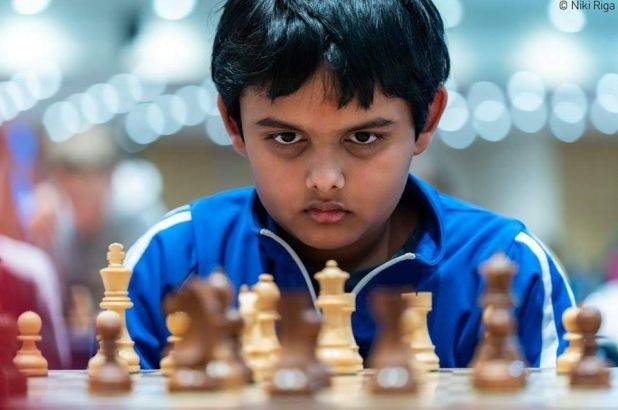 Cau be 12 tuoi tro thanh dai kien tuong co vua tre nhat lich su hinh anh