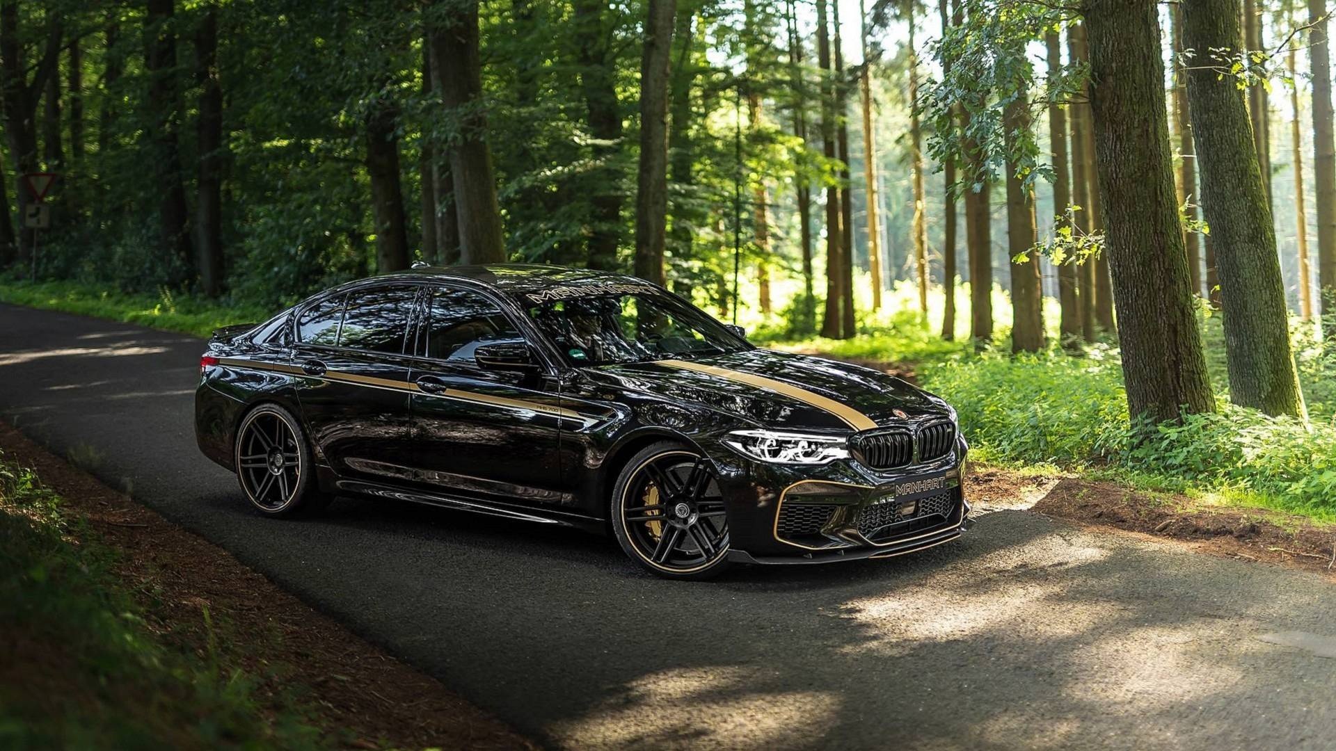 BMW M5 dữ dằn hơn với bản độ của Manhart ảnh 5 BMW M5 du dan hon voi ban do cua Manhart anh 5