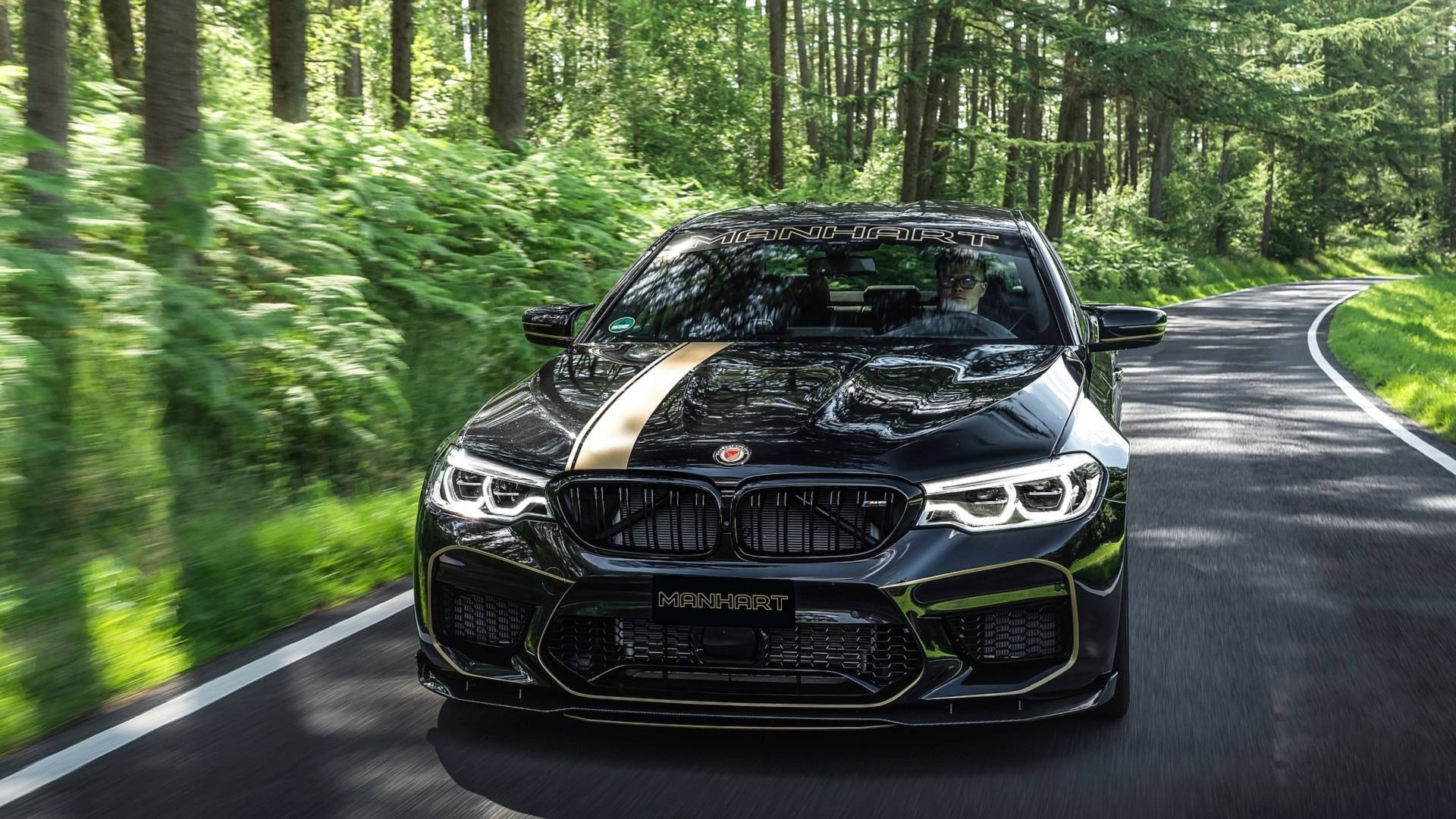 BMW M5 dữ dằn hơn với bản độ của Manhart ảnh 4 BMW M5 du dan hon voi ban do cua Manhart anh 4