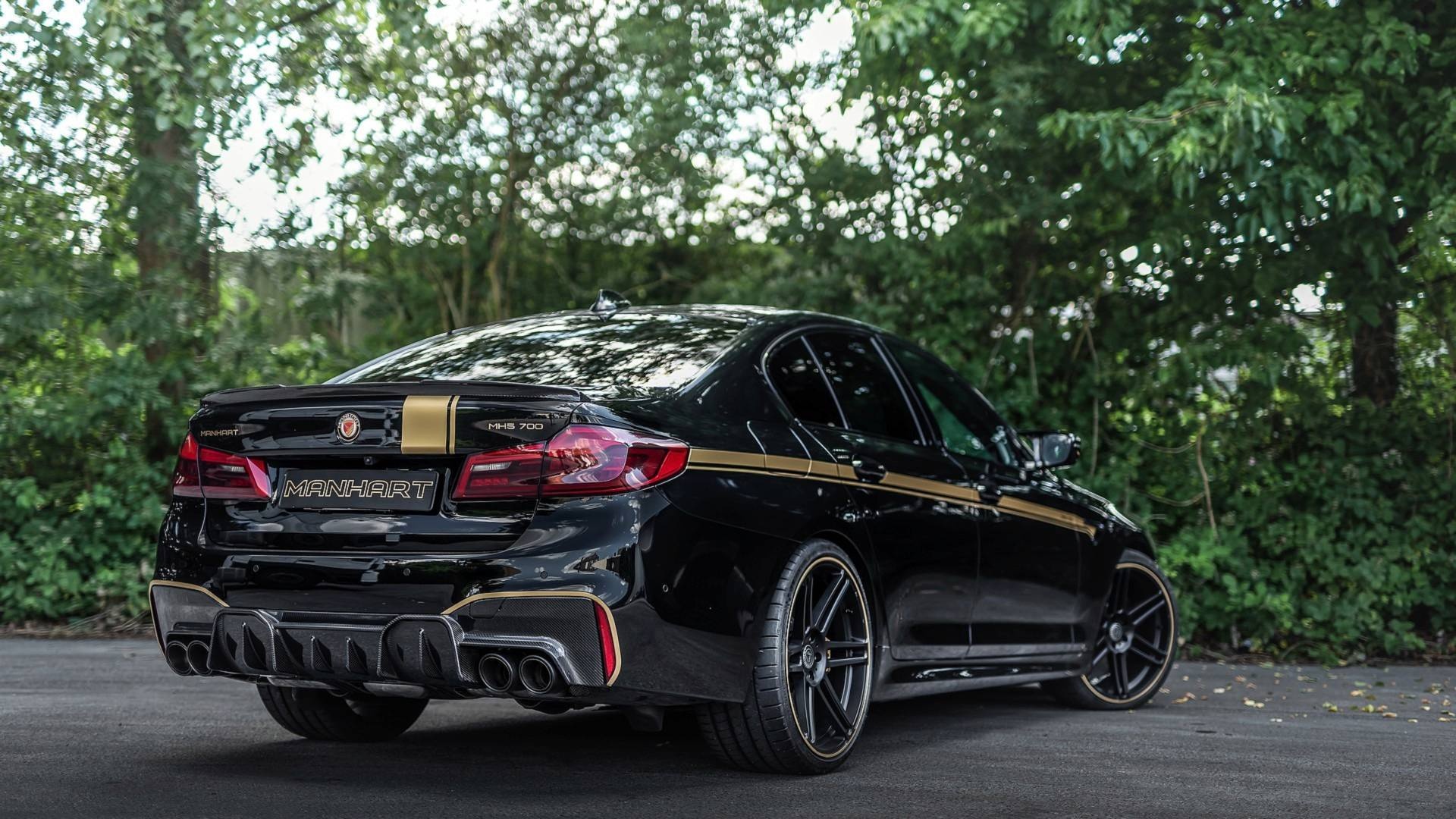 BMW M5 dữ dằn hơn với bản độ của Manhart ảnh 2 BMW M5 du dan hon voi ban do cua Manhart anh 2