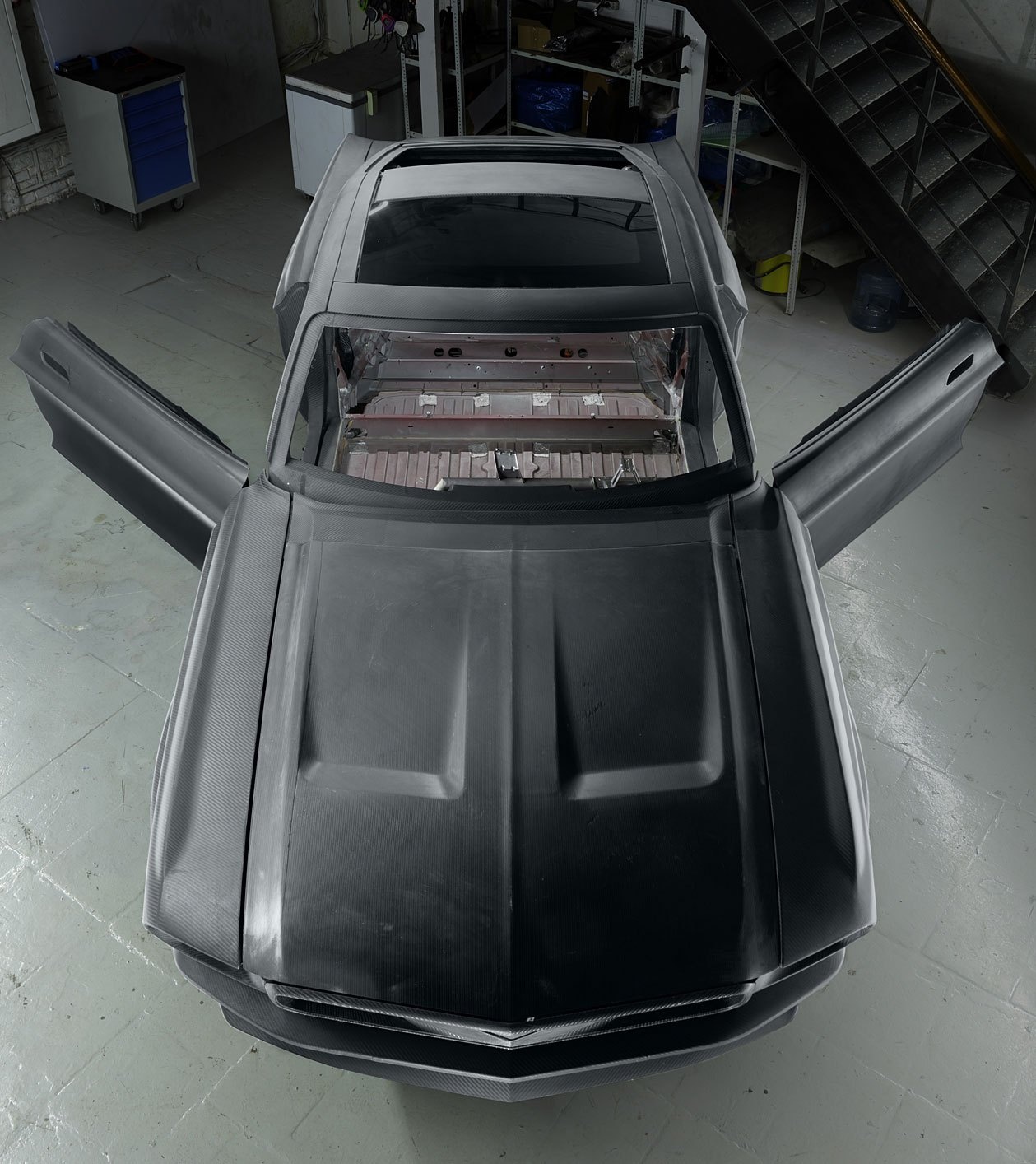 Hang xe Nga che tao xe dien tu Tesla Model S va Ford Mustang anh 3