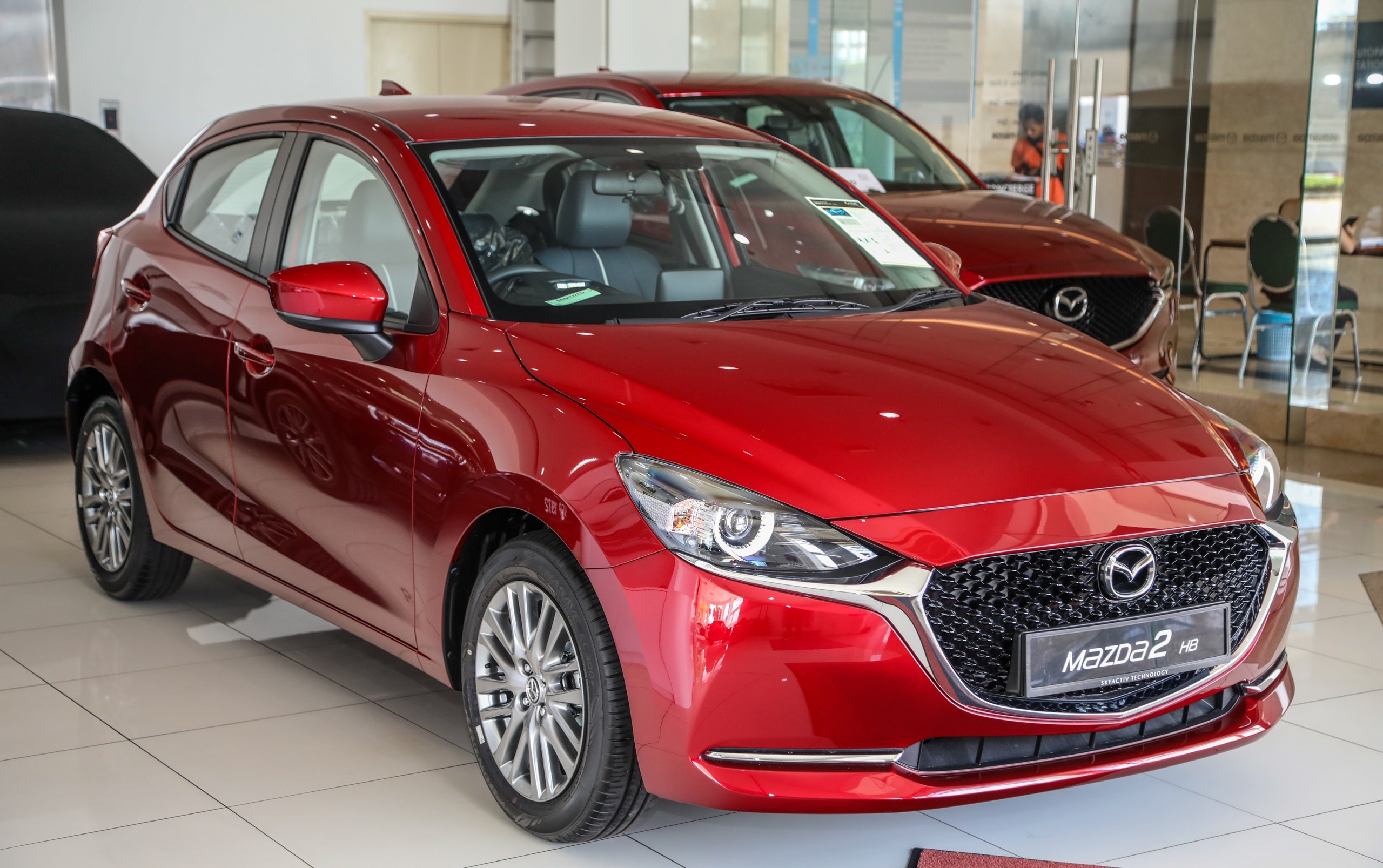Mazda2 the he tiep theo duoc phat trien dua tren Toyota Yaris Hybrid hinh anh