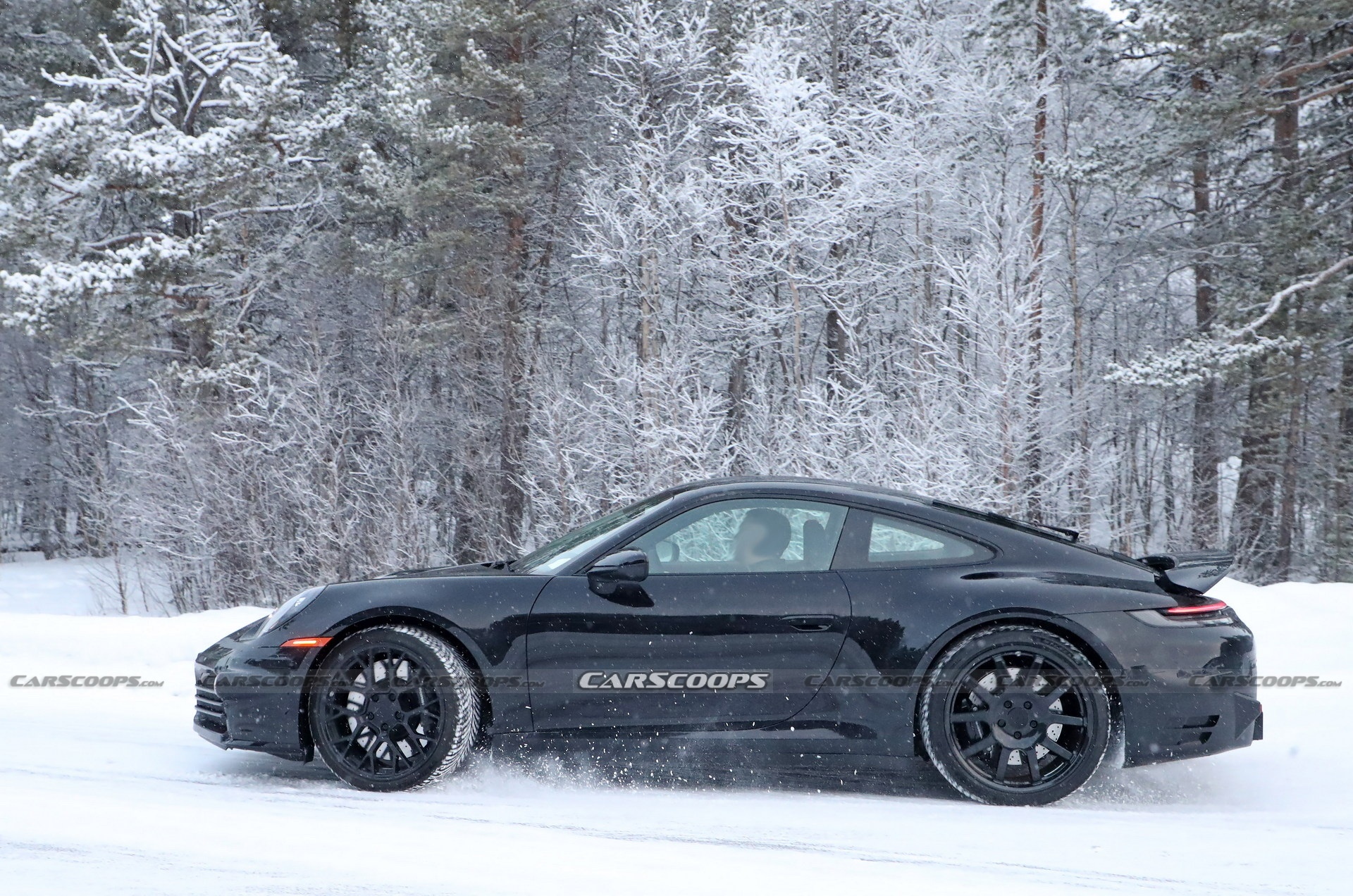 Porsche 911 facelift 2024 lộ diện trên đường thử nghiệm ảnh 7 Porsche 911 facelift 2024 lo dien tren duong thu nghiem anh 7