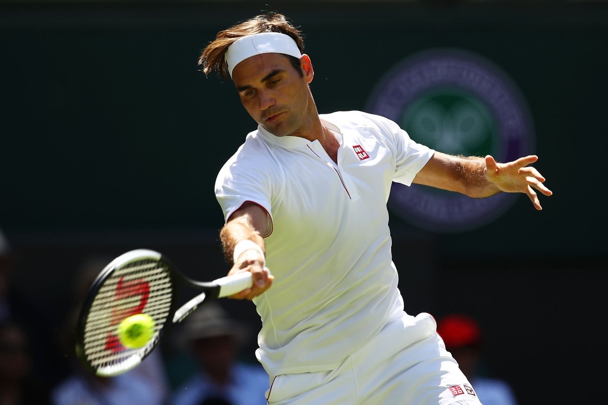 Diện trang phục mới,  Federer dễ dàng vào vòng 2 Wimbledon ảnh 1 Dien trang phuc moi,  Federer de dang vao vong 2 Wimbledon anh 1