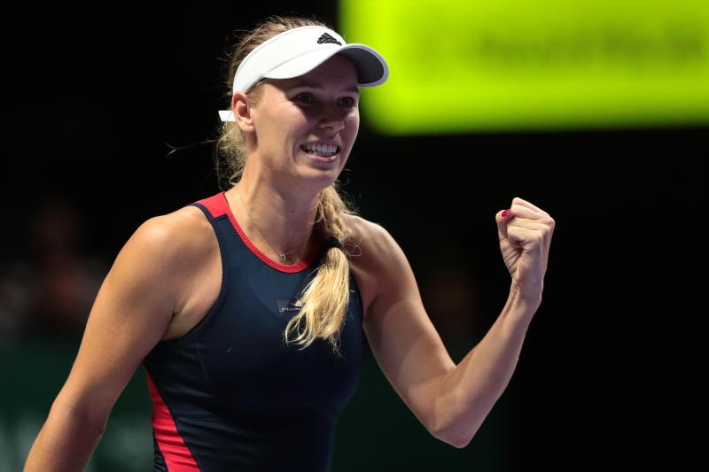 Wozniacki thang tran quyet dau voi Kvitova tai WTA Finals hinh anh