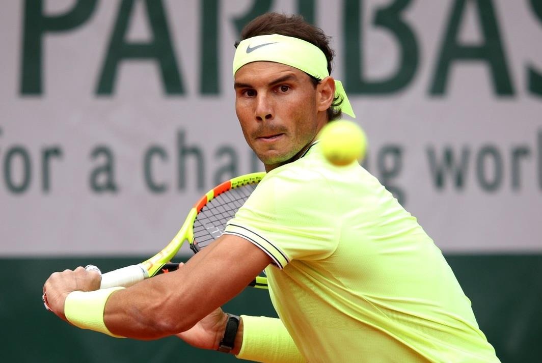 Nadal, Djokovic nhe nhang vao vong 2 cua Phap mo rong hinh anh