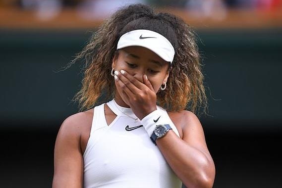 Con ac mong cua cac tay vot hat giong trong ngay khai man Wimbledon hinh anh