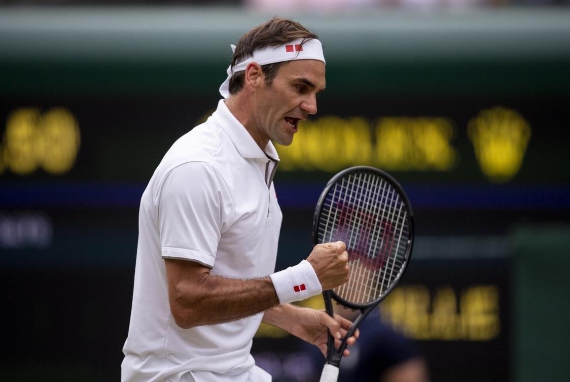 Federer can moc 100 tran thang tai Wimbledon sau khi ha Nishikori hinh anh