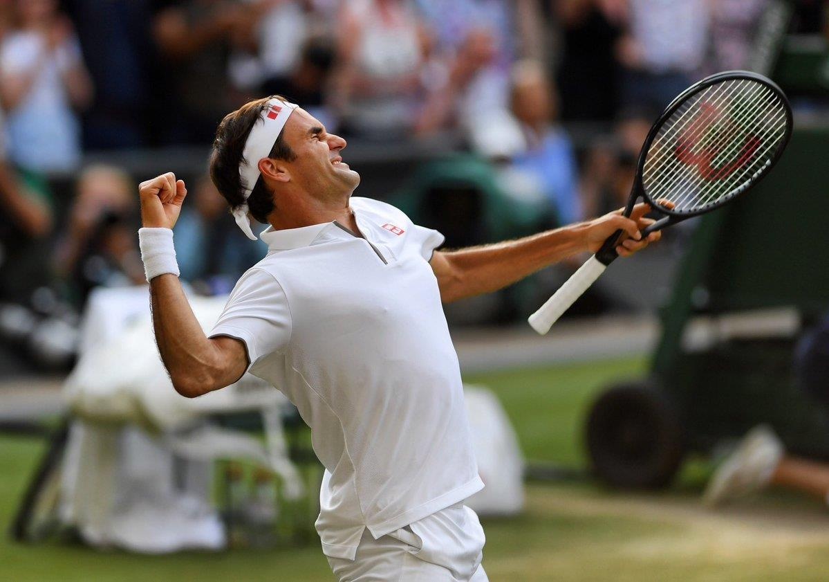 Federer an mung day cam xuc khi ha Nadal de vao chung ket Wimbledon hinh anh