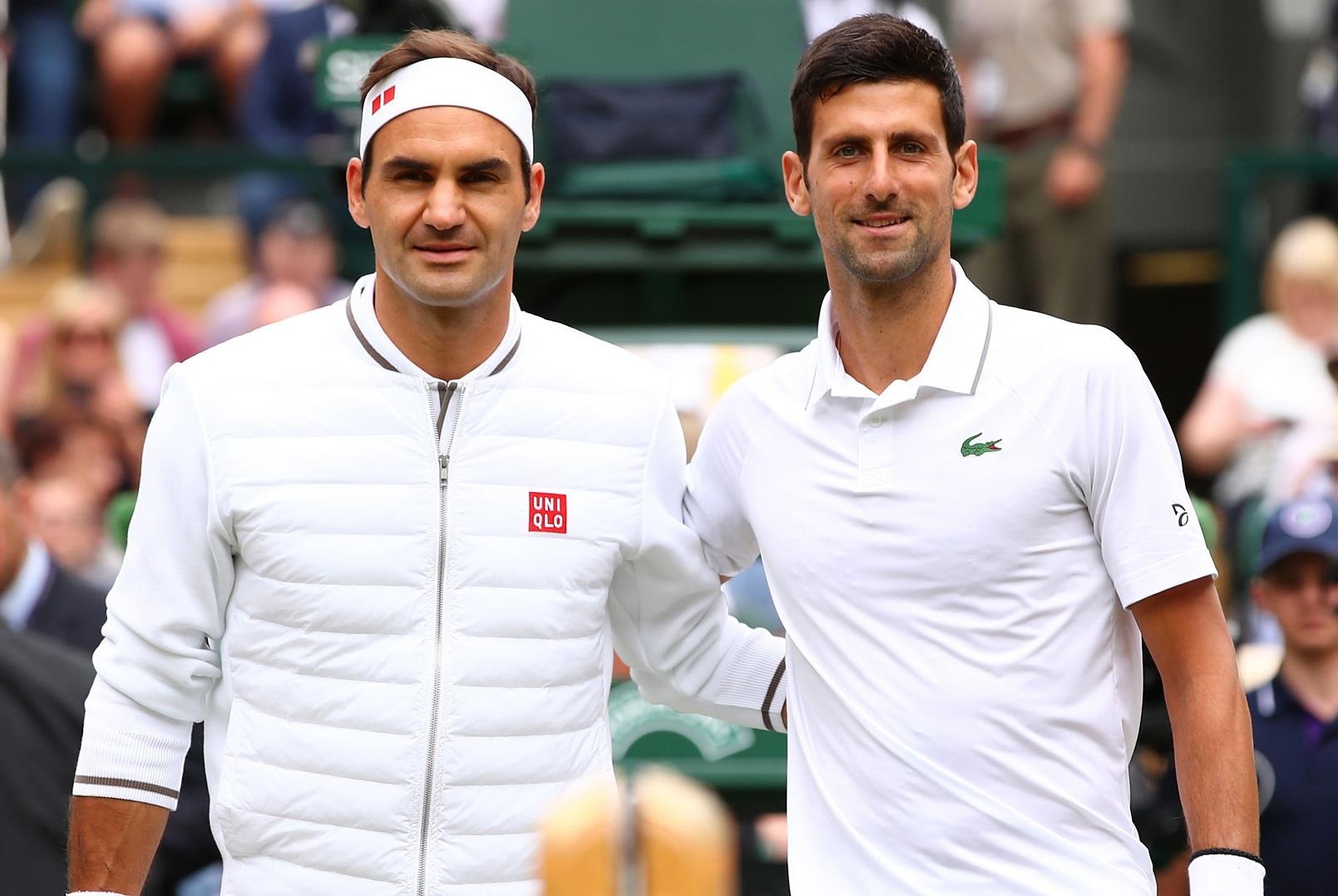 Federer chung nhanh voi Djokovic tai US Open hinh anh