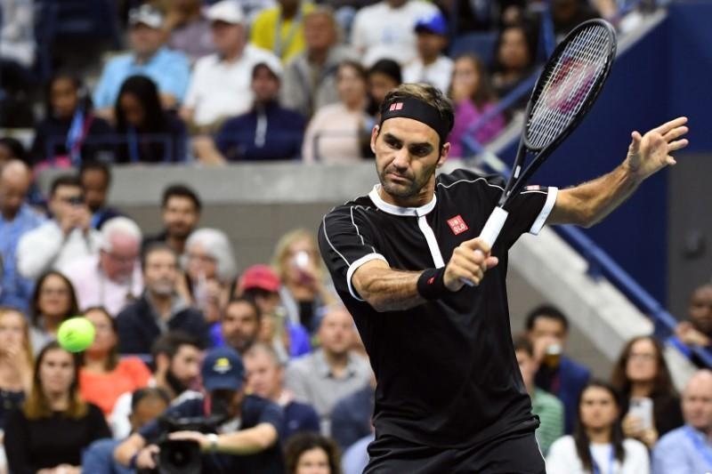 Federer nguoc dong ha ban than cua Ly Hoang Nam tai US Open hinh anh