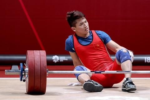 A quan ASIAD Trinh Van Vinh bi cam thi dau 4 nam hinh anh