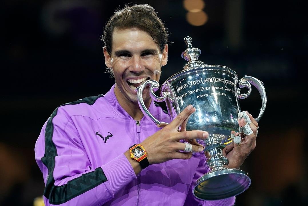 Nadal ap sat ky luc danh hieu Grand Slam cua Federer hinh anh