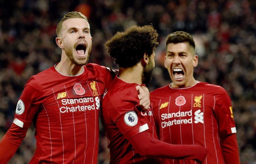 Liverpool bo xa Man City 9 diem sau tran thang 3-1 hinh anh