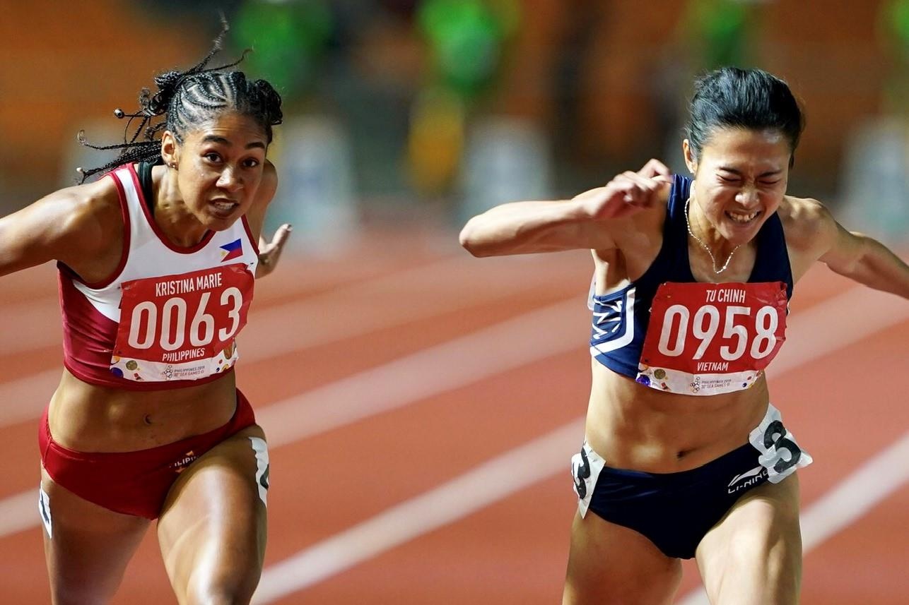 Le Tu Chinh vuot 2 doi thu nhap tich, gianh HCV noi dung 100 m hinh anh