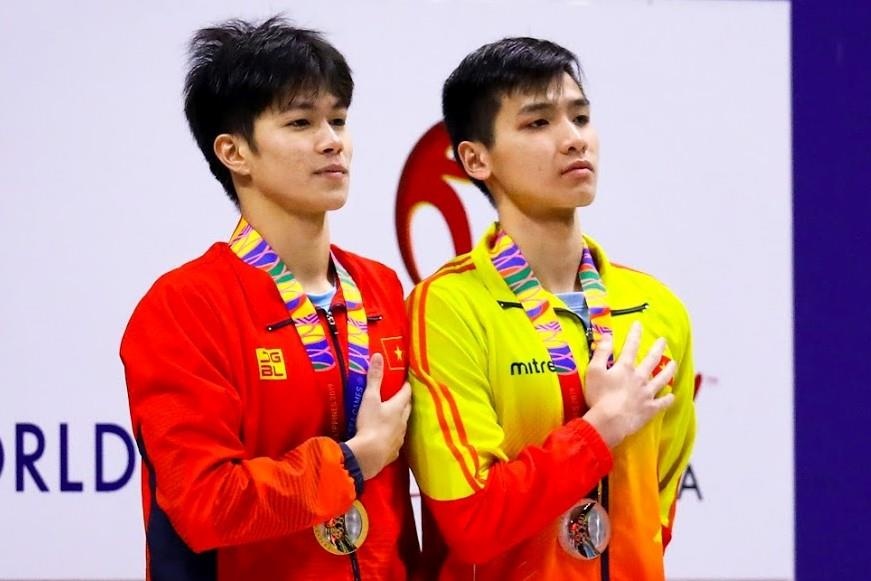 Kinh ngu Hung Nguyen, Kim Son dung chung buc nhan huy chuong SEA Games hinh anh