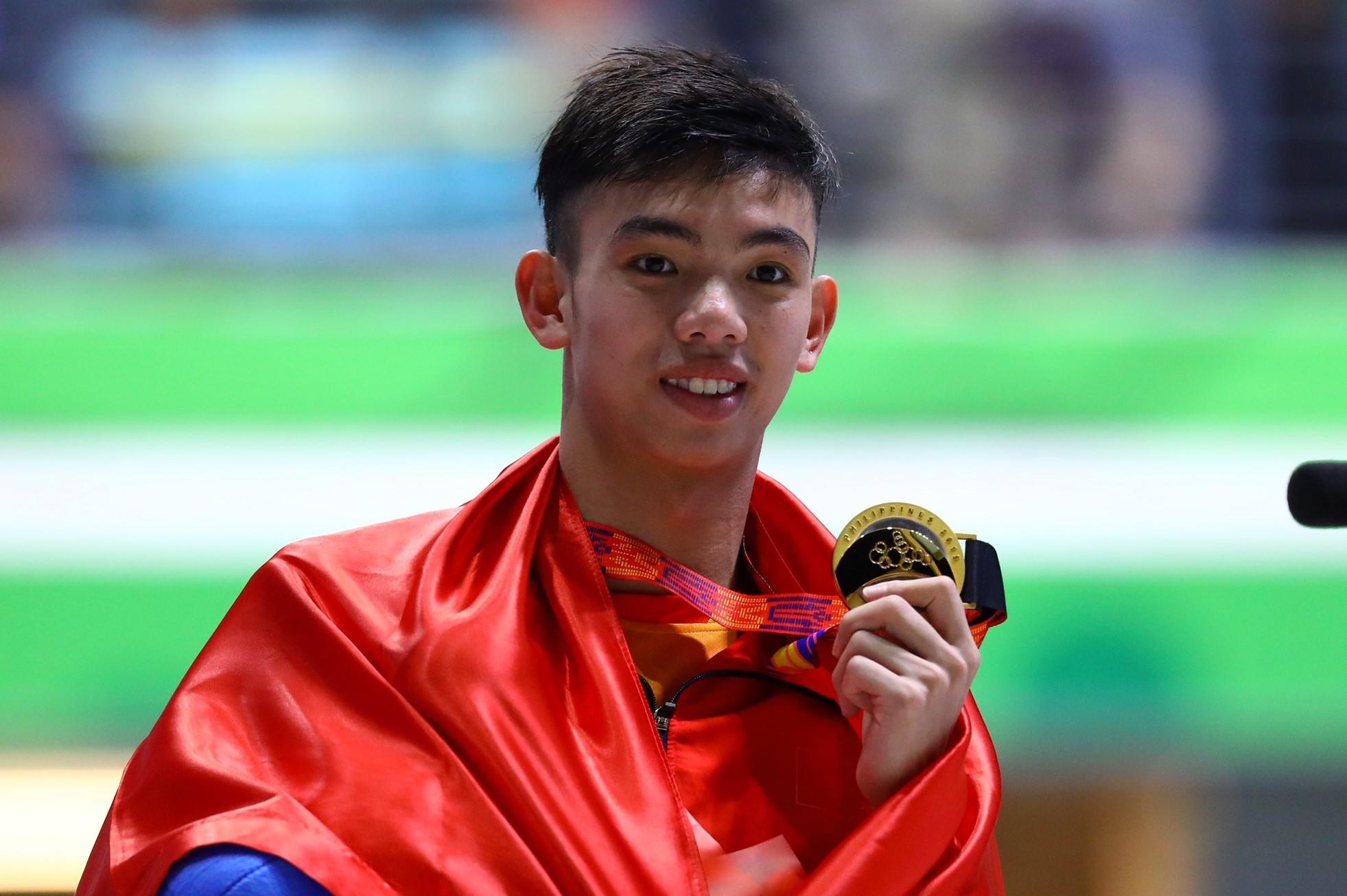 SEA Games: Huy Hoang gianh huy chuong boi ngoai troi 10 km hinh anh
