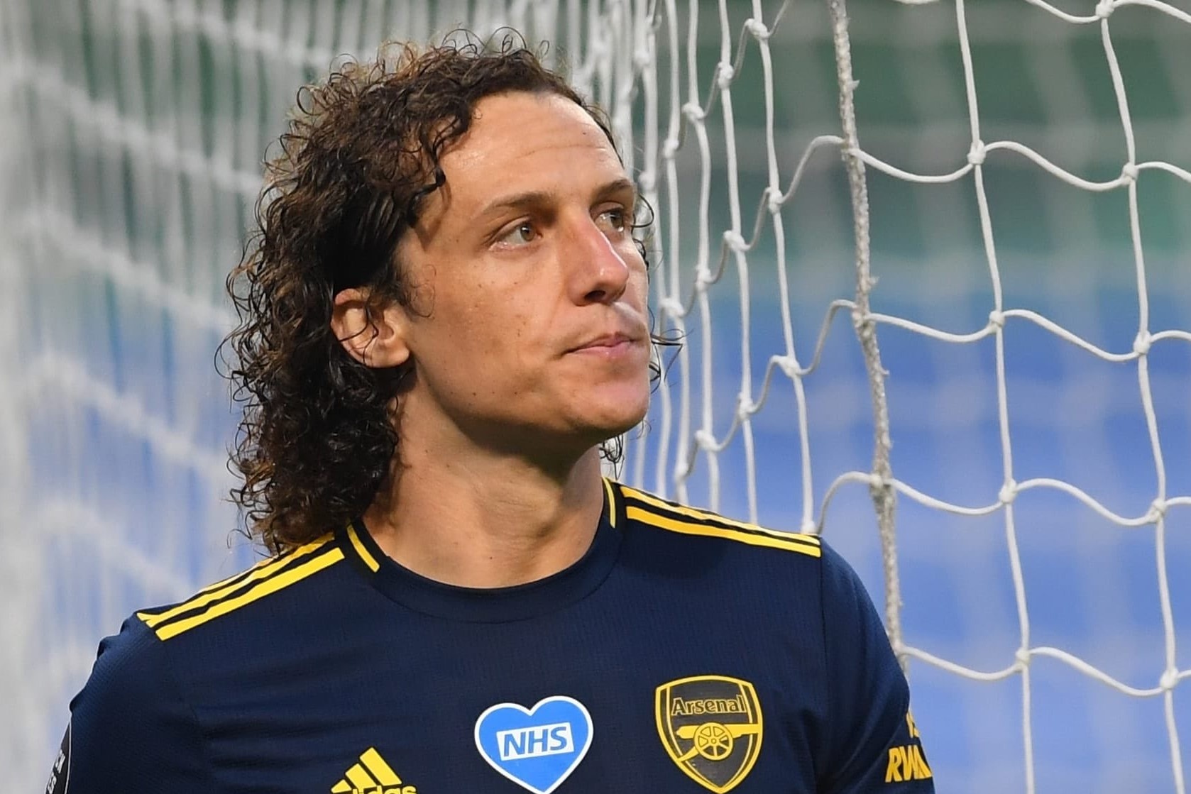 Bao chau Au che gieu David Luiz giup Man City ha Arsenal hinh anh