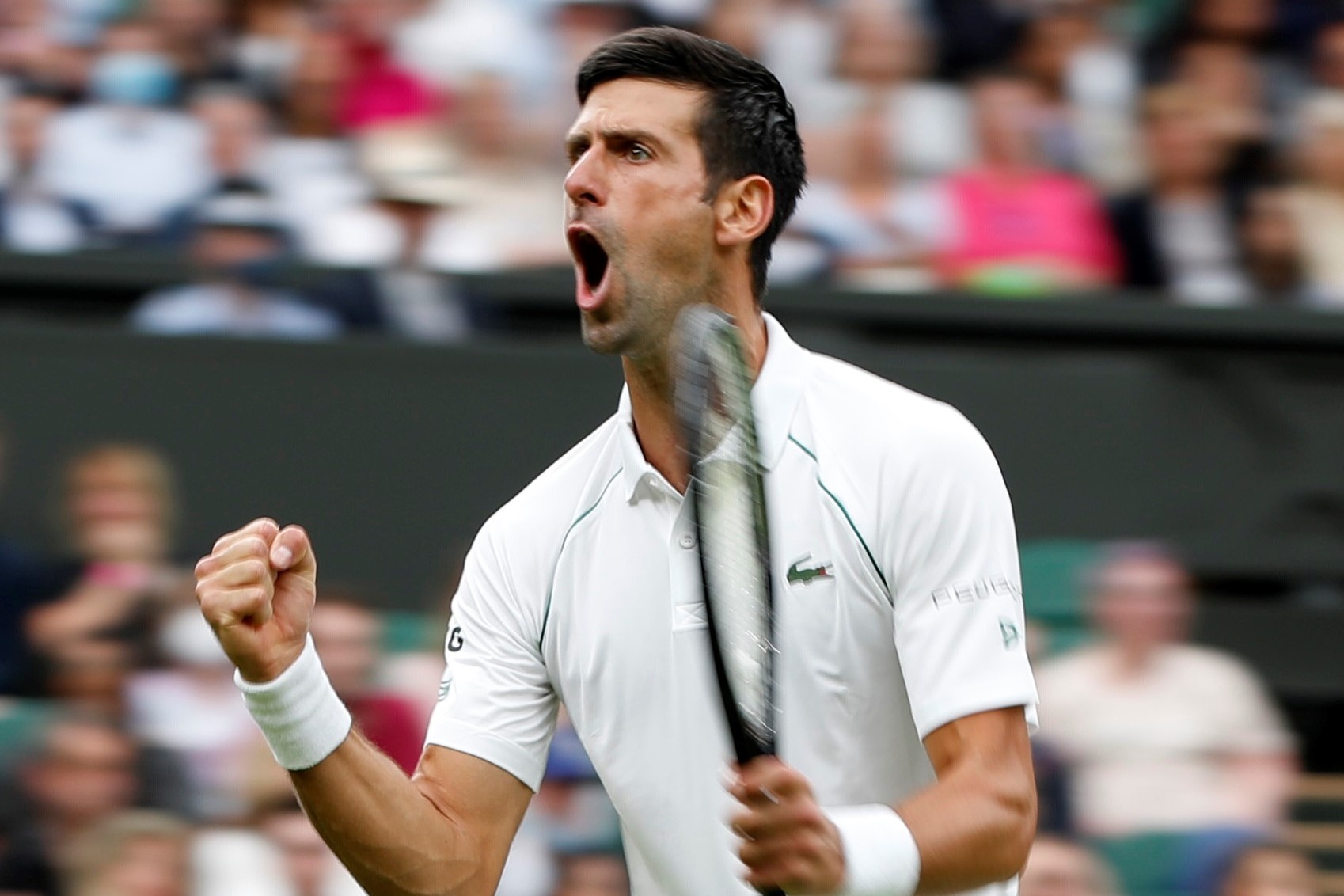 Djokovic nguoc dong o tran khai man Wimbledon hinh anh