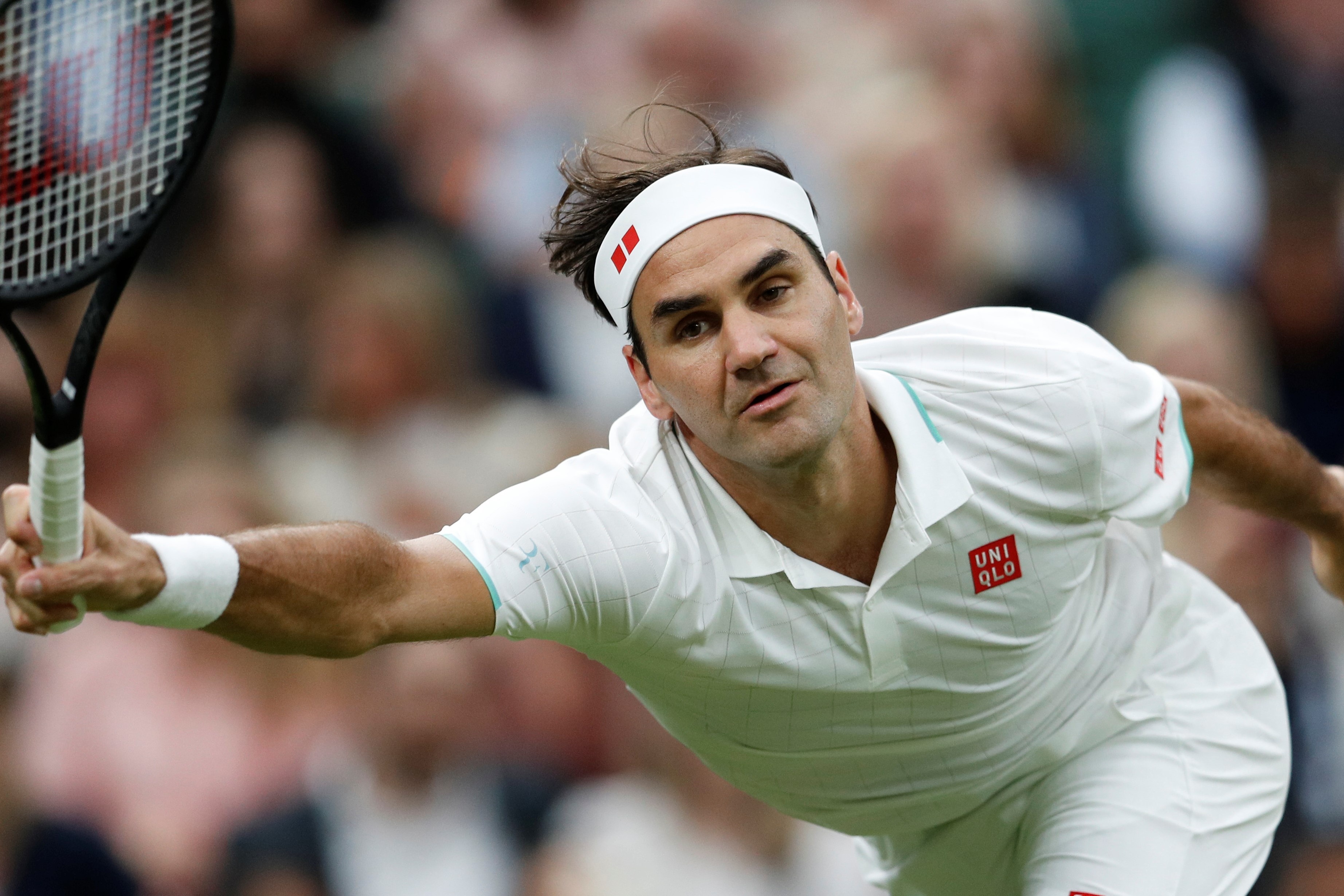 Federer can 5 set de vao vong 2 Wimbledon hinh anh