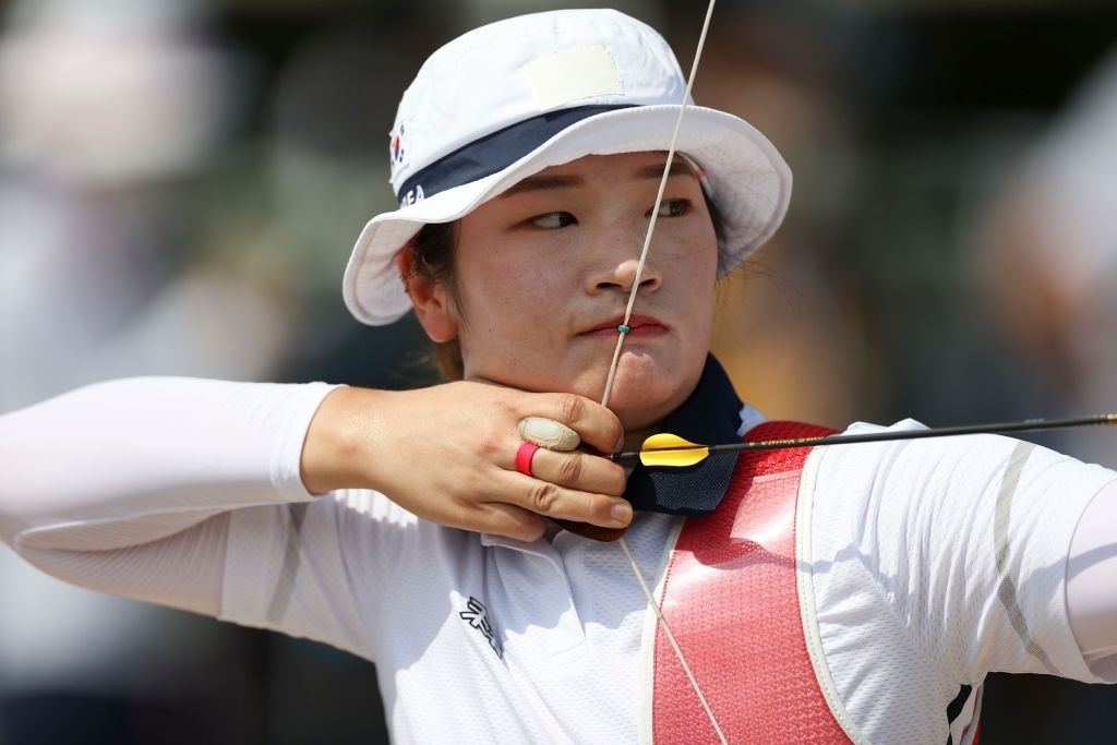 Ban cung Han Quoc lap 3 ky luc Olympic moi hinh anh