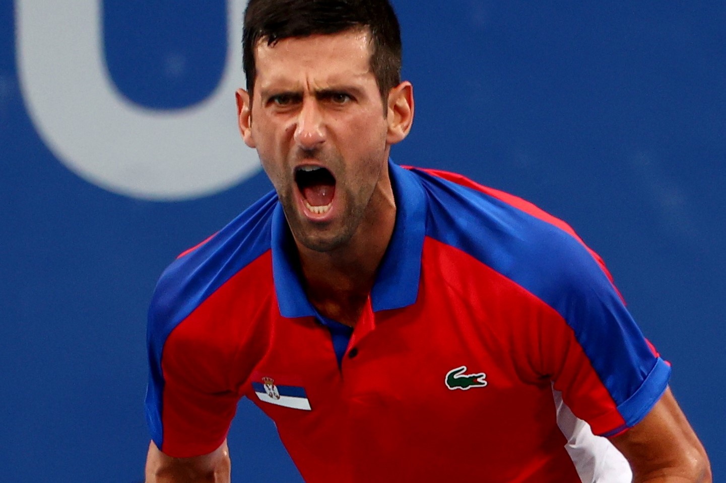 Djokovic thang tran thu hai tai Olympic Tokyo hinh anh