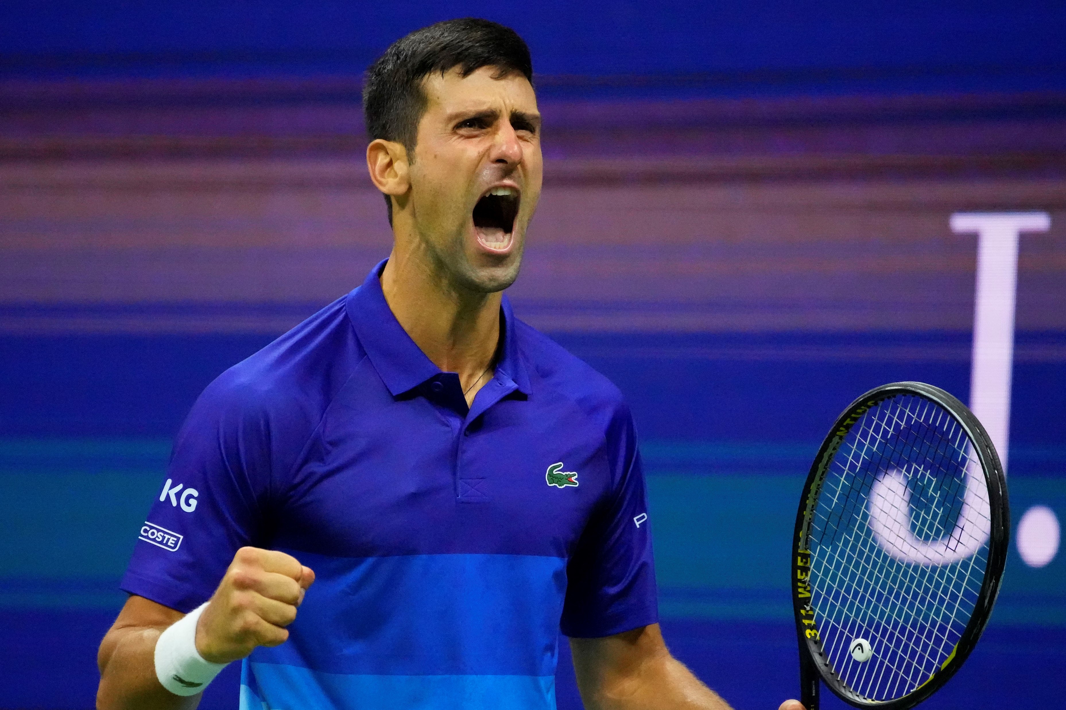 Djokovic vao chung ket US Open sau 5 set hinh anh