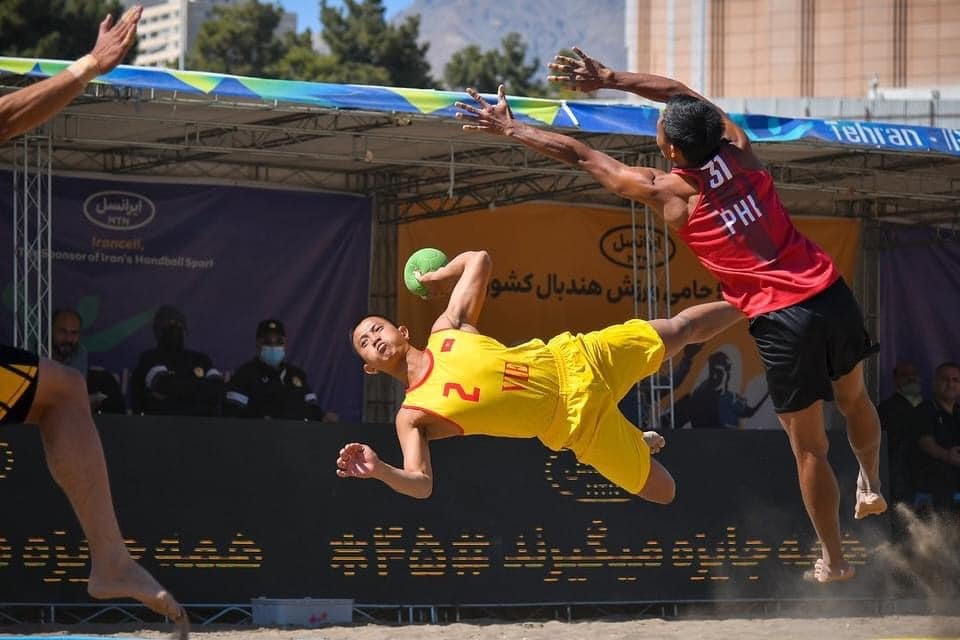 Viet Nam thang dam Singapore o tran mo man bong nem bai bien SEA Games hinh anh