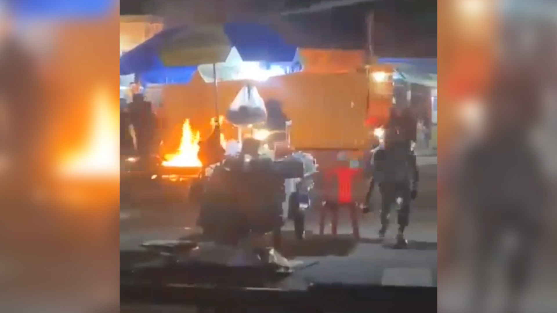 Nhom thanh nien cam hung khi, bom xang hon chien trong dem hinh anh