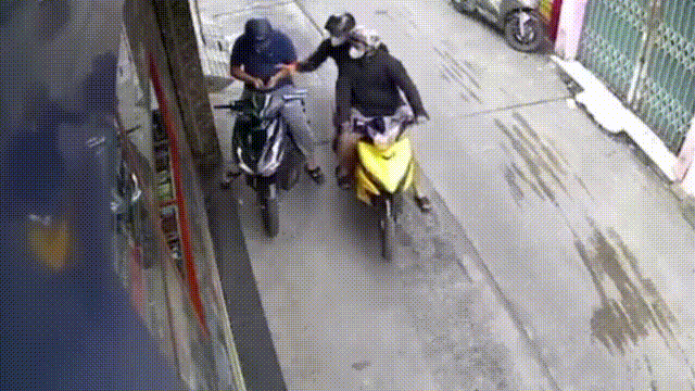 Nguoi dan ong bi xit hoi cay, giat dien thoai o TP.HCM hinh anh