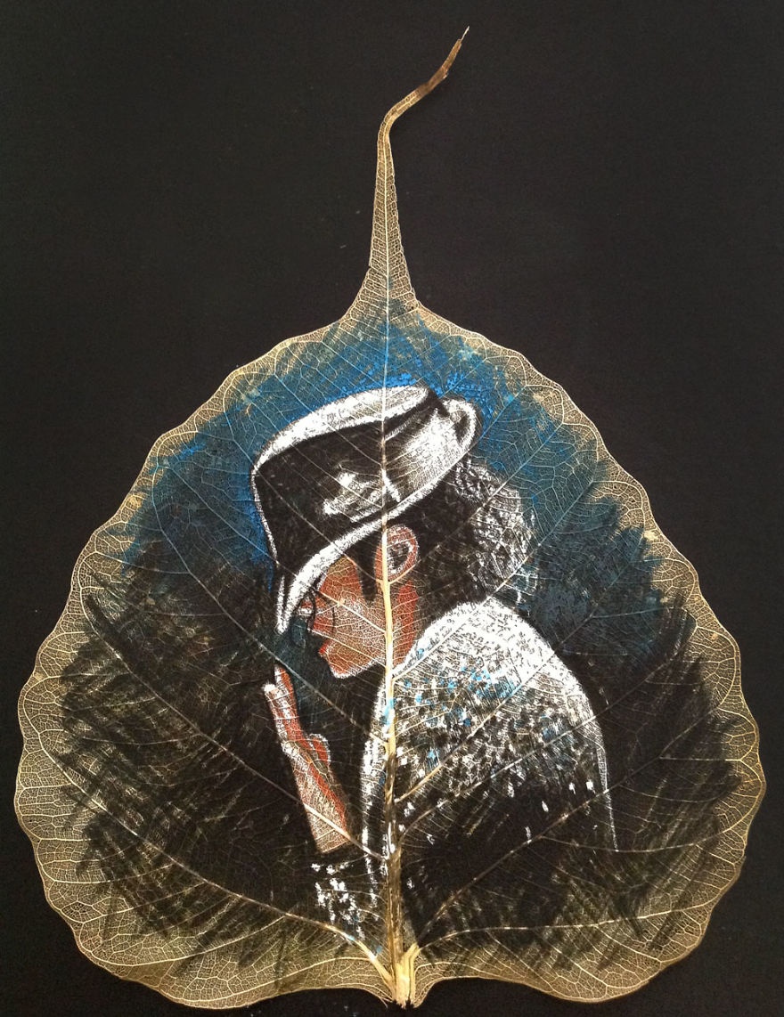 chang trai ve tranh tren la cay anh 5