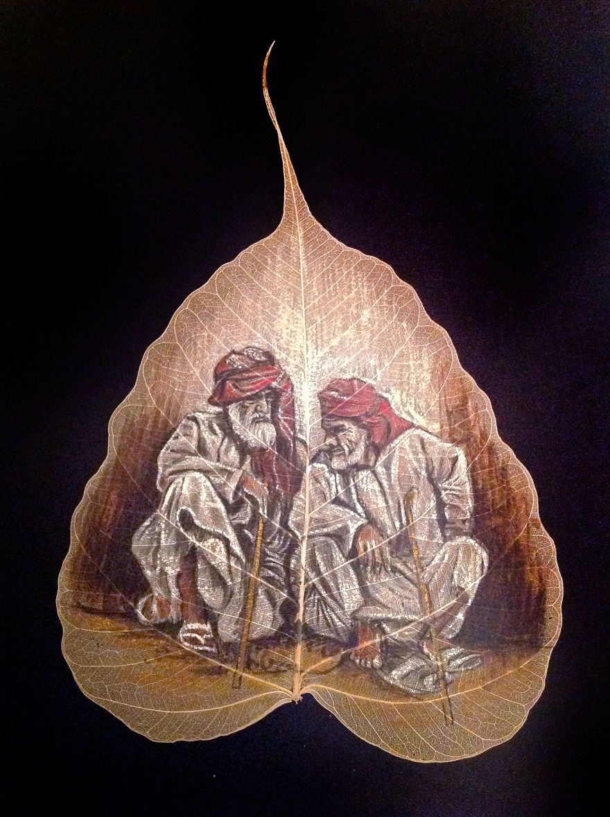 chang trai ve tranh tren la cay anh 8