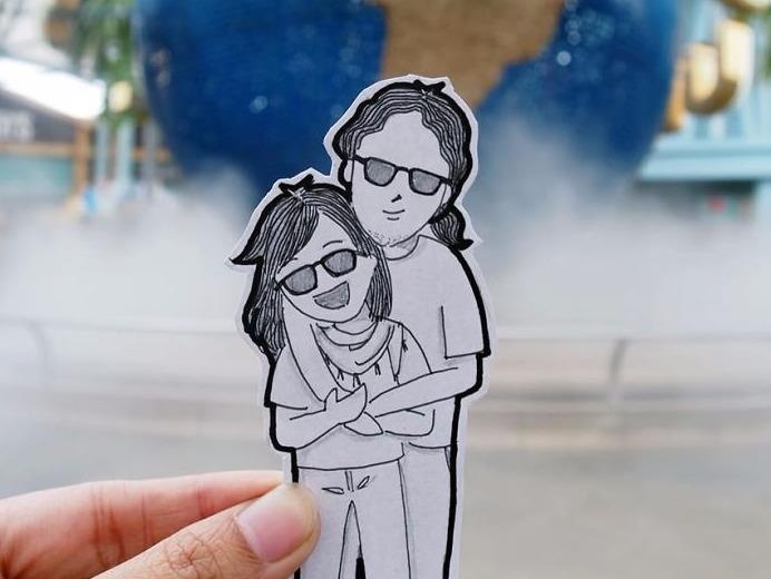 Doi tre check-in bang tranh ve thay vi anh chup hinh anh