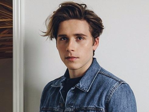 Cau ca nha Beckham: '13 tuoi, toi moi biet cha me noi tieng' hinh anh