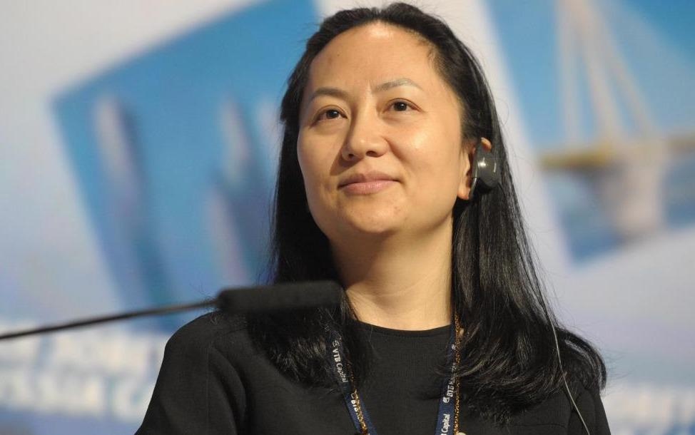 CFO Huawei vua bi bat: Tu tram anh the phiet den quan co My - Trung hinh anh