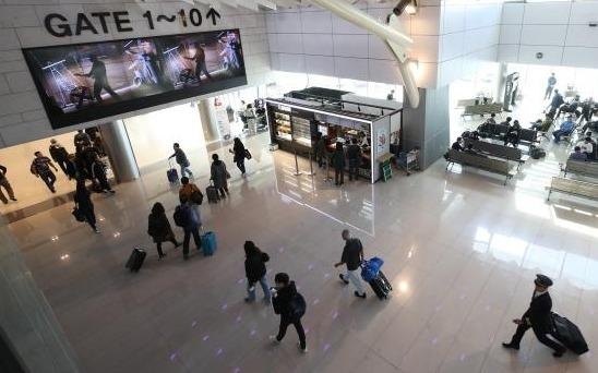 Quan chuc Nhat bi bat tai Seoul vi tan cong nhan vien san bay hinh anh