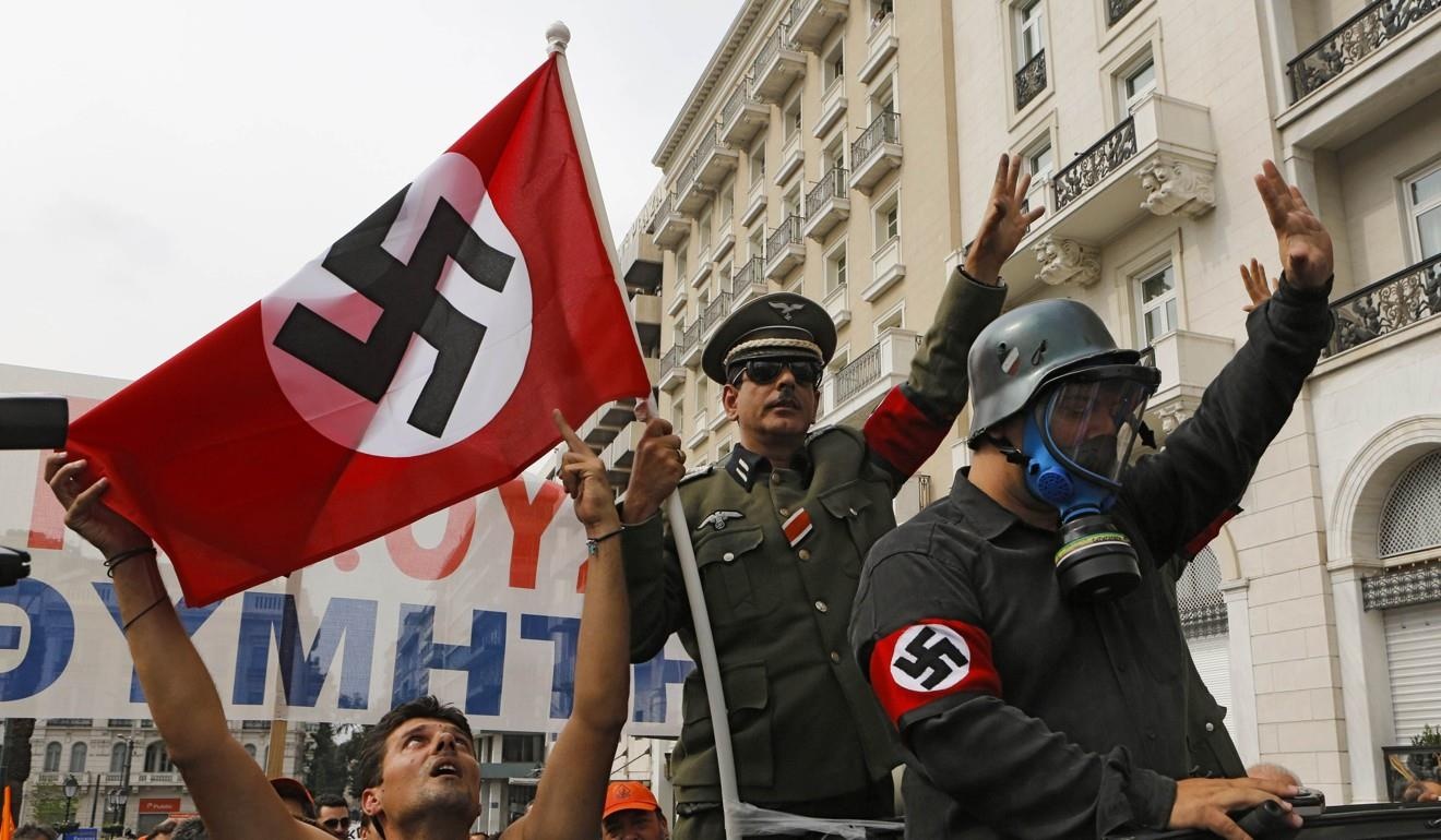 Hy Lap doi Duc boi thuong 336 ty USD cho toi ac thoi the chien hinh anh