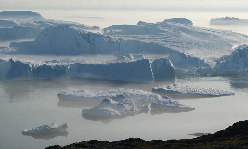 Tong thong Trump dinh mua lai Greenland anh 1