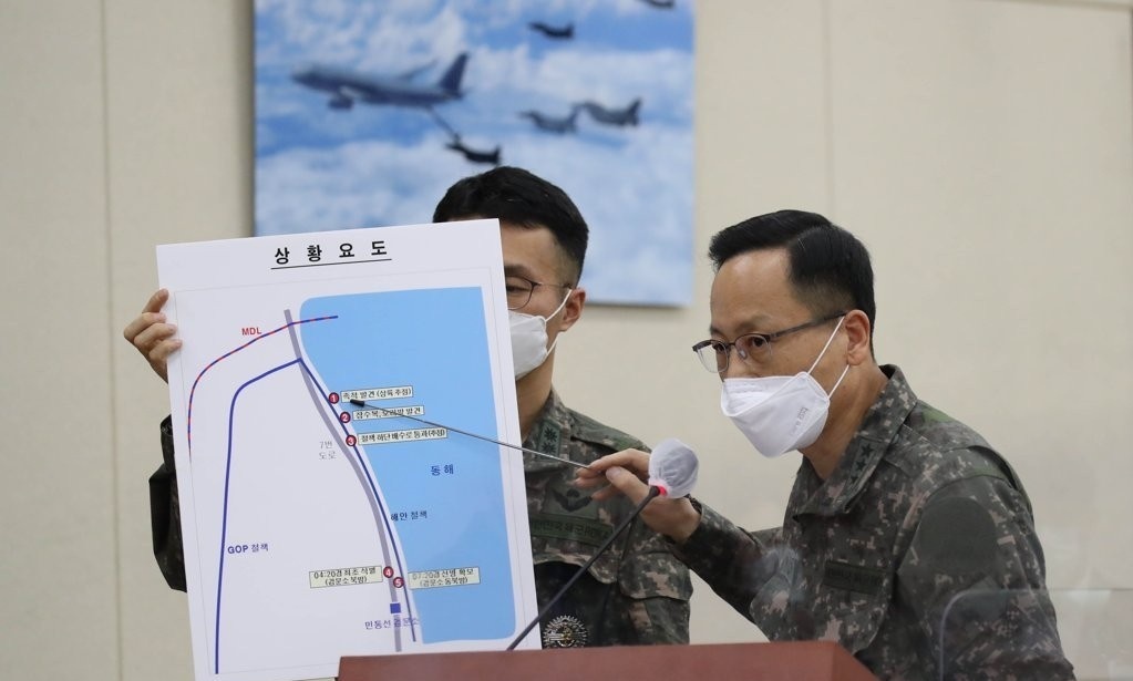 Nguoi dan ong Trieu Tien mac do lan vuot bien sang Han Quoc hinh anh