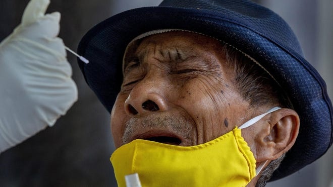 Nguoi giau Thai Lan mo tiec, nguoi ngheo ganh hau qua vi dich hinh anh