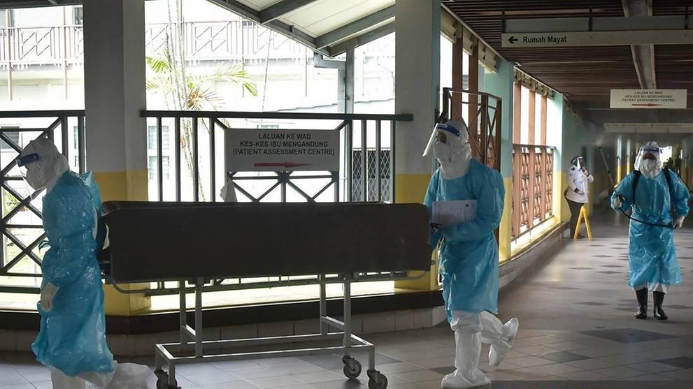 nguoi chet vi Covid-19 anh 1