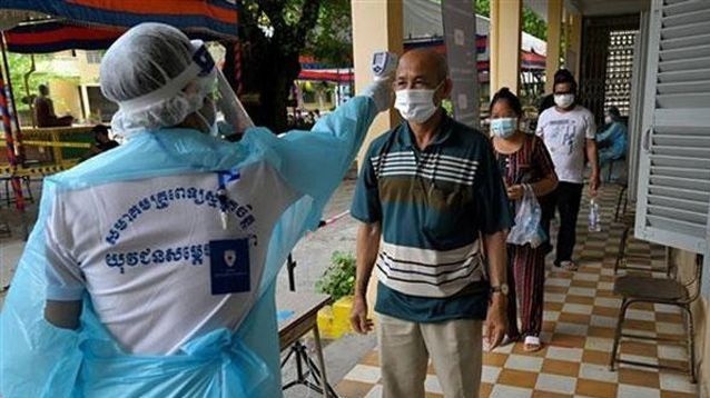 Lao tang cuong cac bien phap phong dich Covid-19 tai thu do Vientiane hinh anh