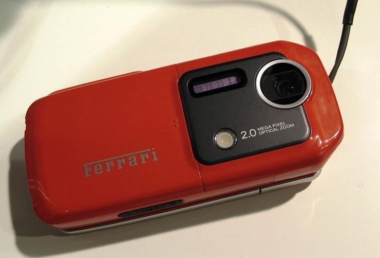 Dien thoai zoom quang 3X, ong kinh tiem vong da co tu 2004 hinh anh