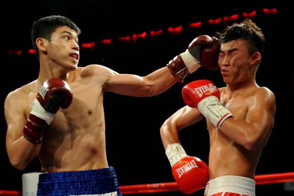 Vo si Viet sang Trung Quoc tranh dai vo dich voi tay dam chu nha hinh anh